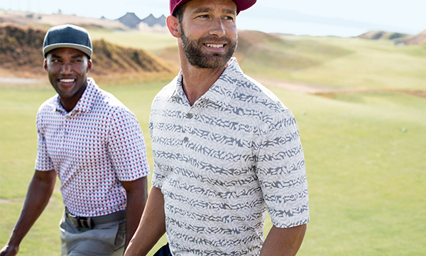 Two men wearing Cutter & Buck limited-edition Pike Polos