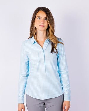 Woman wearing a lakeshore blue Cutter & Buck Womens Reach Oxford Stripe Popover Long Sleeve Dress Shirt