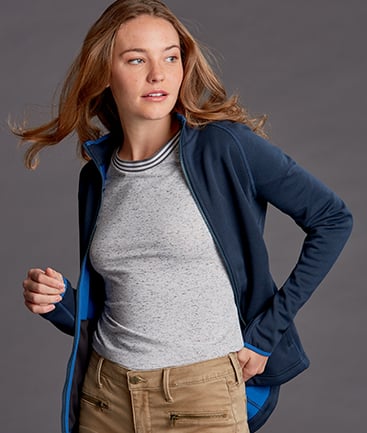 Woman wearing Cutter and Buck ladies Discovery Windblock Jacket.