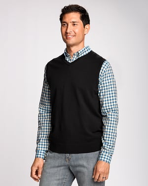 Man wearing Cutter & Buck Lakemont Sweater Vest in Black