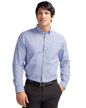 Man wearing Cutter & Buck Easy Care Stretch Gingham Mens Long Sleeve Dress Shirt in Tour Blue