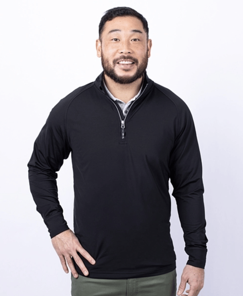 Man Wearing Adapt Eco Knit Stretch Recycled Quarter Zip Pullover