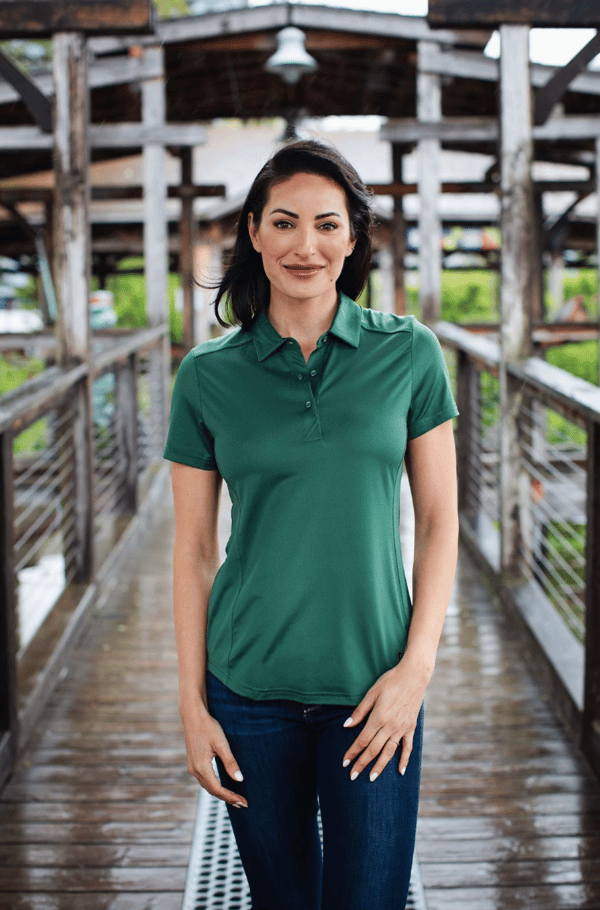 woman outside wearing cutter and buck short sleeve polo