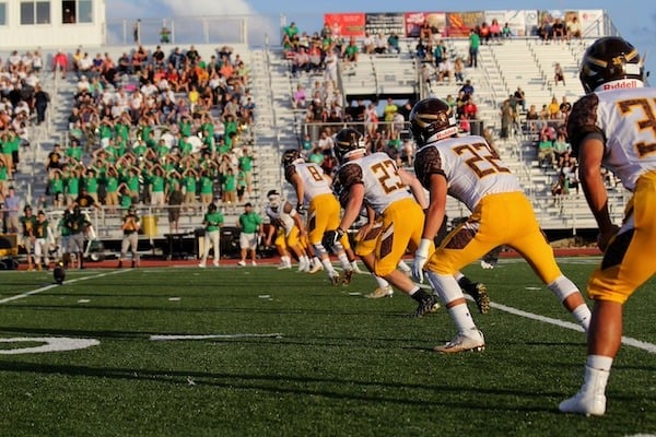 College football team on the field for a game