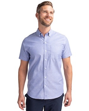 Man wearing a light blue Cutter & Buck Stretch Oxford Mens Short Sleeve Dress Shirt