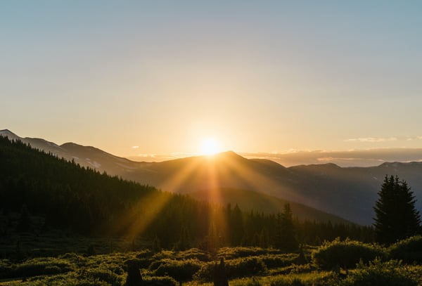 image of a sunrise over mountains