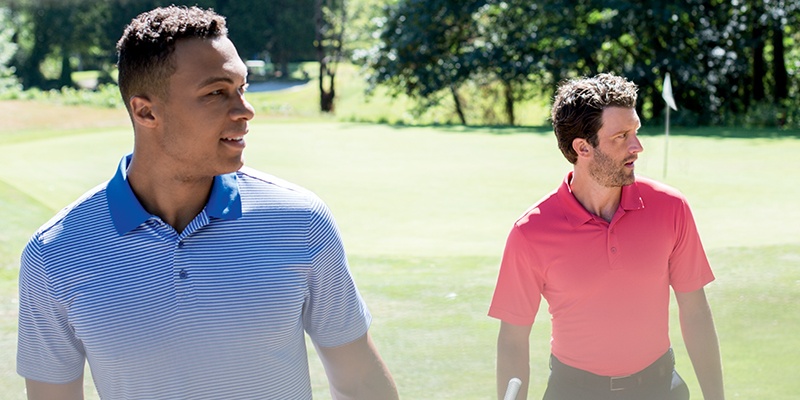 Two men wearing Cutter and Buck Men's Forge Polos